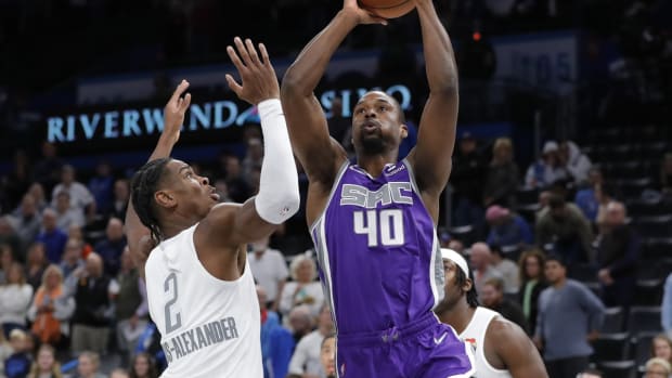 Nov 12, 2021; Oklahoma City, Oklahoma, USA; Sacramento Kings forward Harrison Barnes (40) shoots as Oklahoma City Thunder guard Shai Gilgeous-Alexander (2) defends during the first quarter at Paycom Center. Mandatory Credit: Alonzo Adams-USA TODAY Sports